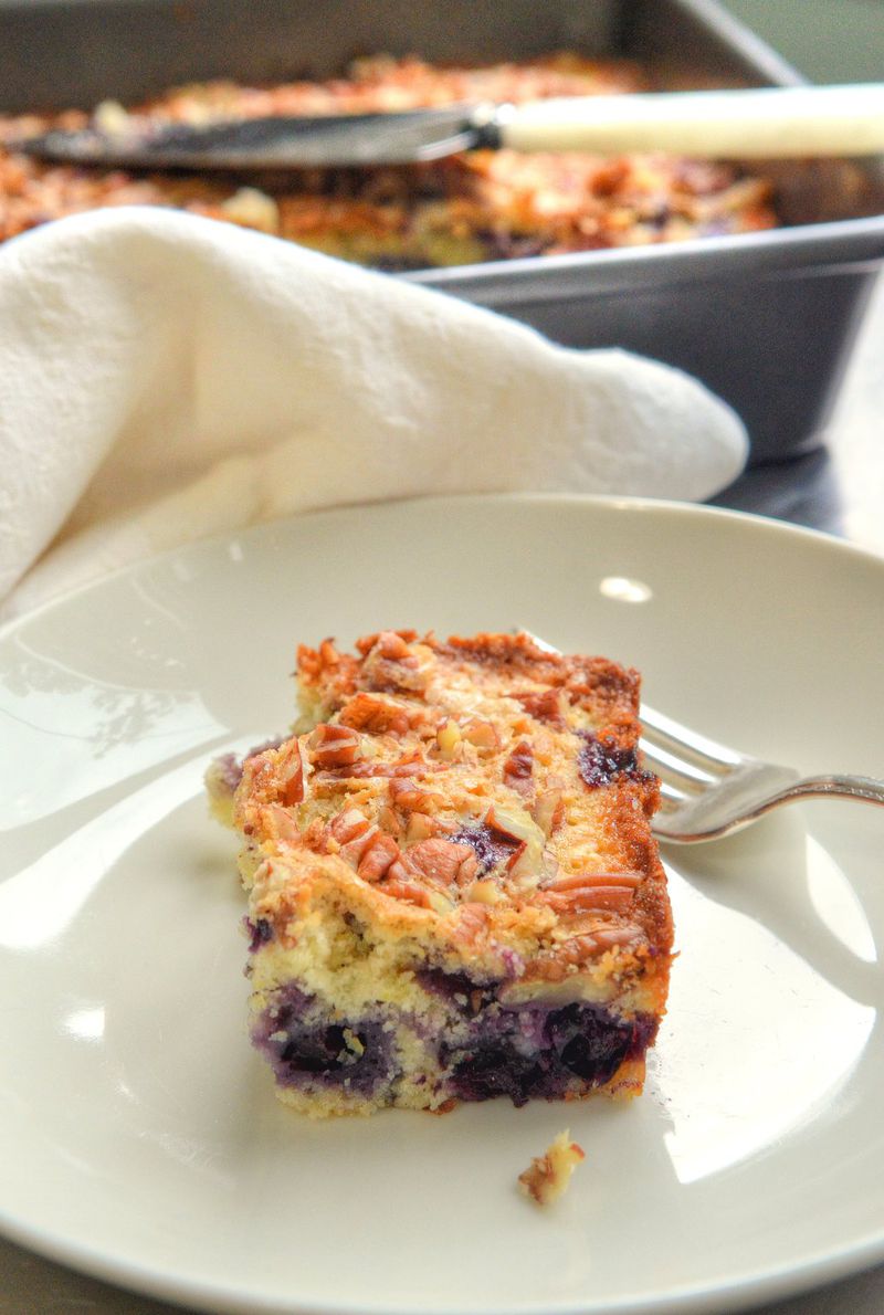 Blueberry Snack Cake with Toasted Pecans can serve as an afternoon snack for the kids and/or as breakfast for you. STYLING BY WENDELL BROCK / CONTRIBUTED BY CHRIS HUNT PHOTOGRAPHY