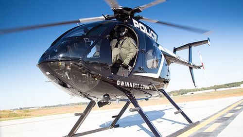 A man is accused of pointing a laser at a Gwinnett Police Department helicopter.