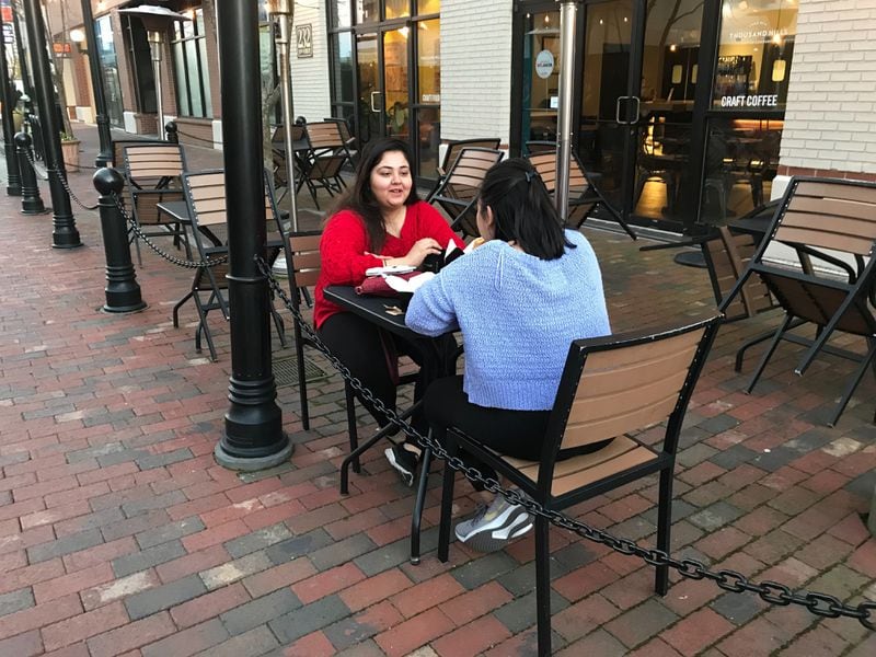 What Super Bowl? Mahnoor Fatima and Riya Patel walked to Atlantic Station on Sunday to grab lattes and croissants from Land of a Thousand Hills Coffee House.