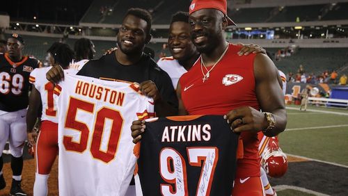 Cincinnati Bengals defensive tackle Geno Atkins, left, and Kansas City Chiefs outside linebacker Justin Houston, right, in the second half of an NFL preseason football game, Saturday, Aug. 19, 2017, in Cincinnati. The Chiefs won 30-12. (AP Photo/Gary Landers)