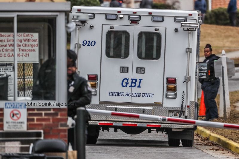 The GBI crime scene unit arrives on the scene of an officer-involved shooting at an apartment complex on Middleton Road in northwest Atlanta. JOHN SPINK / JSPINK@AJC.COM