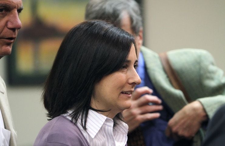 Andrea Sneiderman pleads not guilty to charges she killed husband