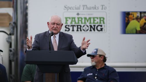 Secretary of Agriculture Sonny Perdue talks about the Farmers to Families program at Flavor First Growers & Packers in Mills River, N.C., Monday, Aug. 24, 2020. (AP Photo/Nell Redmond)