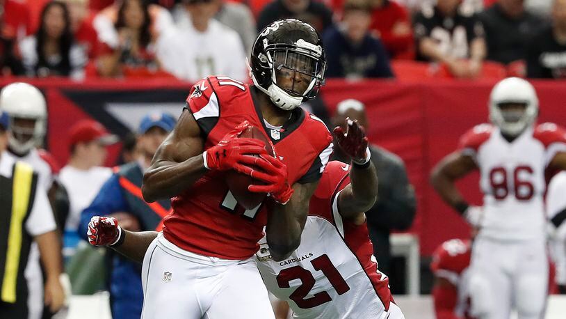 Falcons wide receiver Julio Jones makes one of his four catches for 35 yards in Atlanta's 38-19 win over the Arizona Cardinals Sunday, Nov. 27, 2016, at the Georgia Dome in Atlanta.