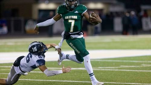 Grayson quarterback Jeff Davis (7) runs the ball during a GHSA High School Football game between the Grayson Rams and the North Paulding Wolfpack at Grayson High School in Loganville, GA., on Friday, November 17, 2023. (Photo/Jenn Finch)