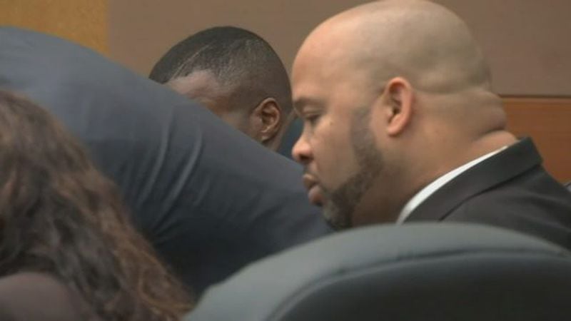 Former East Point police officer Marcus Eberhart was sentenced to life in prison in the tasing death of Gregory Towns.