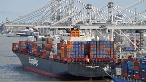 A study funded through a grant from the Georgia Ports Authority found that the ports in Savannah and Brunswick supported 439,220 full- and part-time jobs in the state. That includes 209,235 in Atlanta’s 10-county region, according to the study from the Selig Center for Economic Growth at the University of Georgia. Archived photo by Brant Sanderlin for 100814 foltz ed.