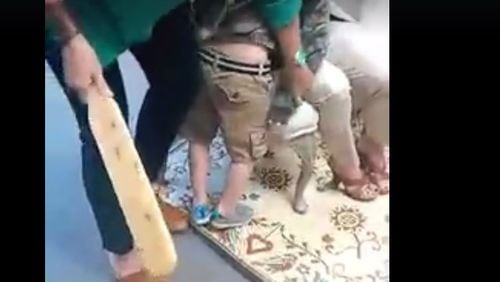 This screen grab came from a video of two Jasper County educators paddling a 5-year-old. Posted online by the child's mother, the video created a national furor and has now been viewed by nearly 6 million people.