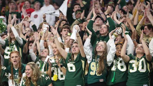 Blessed Trinity students cheer in the fourth quarter of their game against Cartersville in the Class AAAA State Championship at Mercedes-Benz Stadium Wednesday, December 12, 2018, in Atlanta. Blessed Trinity won 23-9. (JASON GETZ/SPECIAL TO THE AJC)