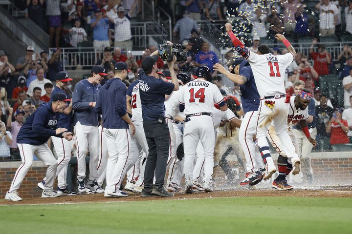  The Braves scored once in the bottom of the ninth to force extra innings, and then won the game on Albies' home run.  (Miguel Martinez / miguel.martinezjimenez@ajc.com 