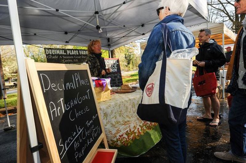 Decimal Place Farm at Freedom Farmers Market is known for its farmstead artisanal goat cheese. Becky Stein for The Atlanta Journal-Constitution