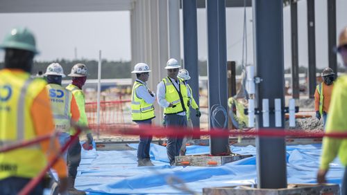 ELLABELL, GA. - JUNE 5, 2023: Workers prepare to pour the concrete floor of the assembly building on the Hyundai Metaplant site, Monday, July 5, 2023, in Ellabell, Ga. (AJC Photo/Stephen B. Morton)