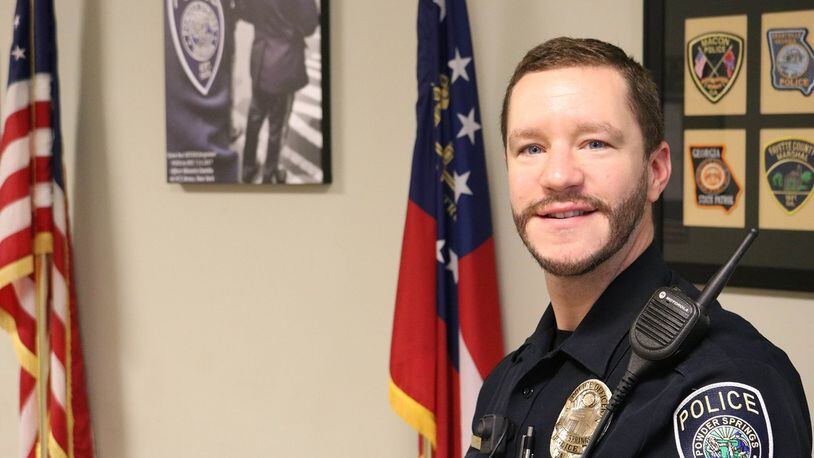 Officer Justin Arndt is growing a beard for “Cops with Beards,” the Powder Springs Police Department’s fundraiser. Proceeds will go to two families during the holidays. CONTRIBUTED