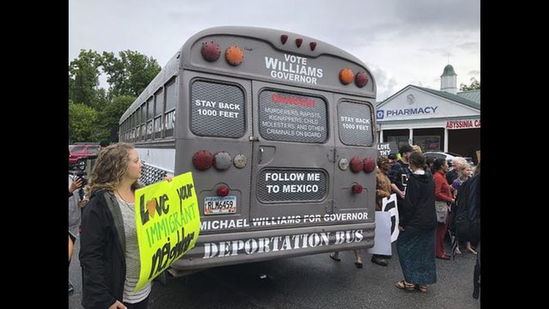 <p>               In this May 20, 2018 photo Georgia Republican gubernatorial candidate Michael Williams participates in a debate in Atlanta. Williams, the former Republican gubernatorial candidate in Georgia who campaigned in a “deportation bus”, has turned himself into county jail, Wednesday, Dec. 26, 2018 after being indicted on charges including insurance fraud. (AP Photo/John Amis)             </p> <p>               FILE - In this May 16, 2018 file photo a Georgia gubernatorial candidate touring the state in a "deportation bus" is greeted with protests by immigrants and other residents in Clarkston, Ga. Michael Williams, the former Republican gubernatorial candidate in Georgia, has turned himself into county jail, Wednesday, Dec. 26, 2018 after being indicted on charges including insurance fraud. (AP Photo/Benjamin Nadler)             </p>