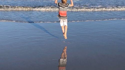 Barbara Beavin submitte this photo of her grandson, Carter Paurowski. “He’s running toward the ocean at Amelia Island, Florida, with such excitement,” she wrote. “His mom, Melissa Paurowski, snapped this pic just in time to catch him aloft and reflected in the wet sand.”