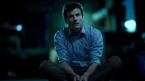 This image released by Netflix shows Jason Bateman in a scene from "Ozark." Bateman was nominated Thursday for an Emmy for outstanding lead actor in a drama series. The 70th Emmy Awards will be held on Monday, Sept. 17.  (Jackson Davis/Netflix via AP)