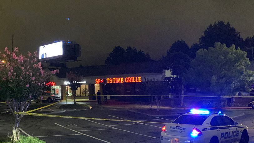 Trayvon Austin, 24, of Decatur, was taken into custody on multiple charges related to the August killing of Kevin Blackwell in the parking lot of Sportstime Bar & Grille, Gwinnett County police said.