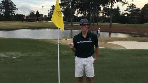 Thomas DeWalt of Westminster grins after a hole-in-one.