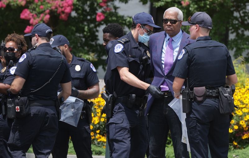 Rep. Hank Johnson (D-GA) is arrested by U.S. Capitol Police during a "Brothers Day of Action on Capitol Hill" protest event outside Hart Senate Office Building in Washington, D.C., on Thursday, July 22, 2021. Advocacy organization Black Voters Matter held the event in support of voting rights and the passage of H.R. 1, the For the People Act, and H.R. 4, the John Lewis Voting Rights Advancement Act by Congress. (Alex Wong/Getty Images/TNS)
