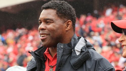 Former Georgia running back Herschel Walker in on the sidelines for the football game against Alabama on Saturday, Oct. 3, 2015, in Athens.