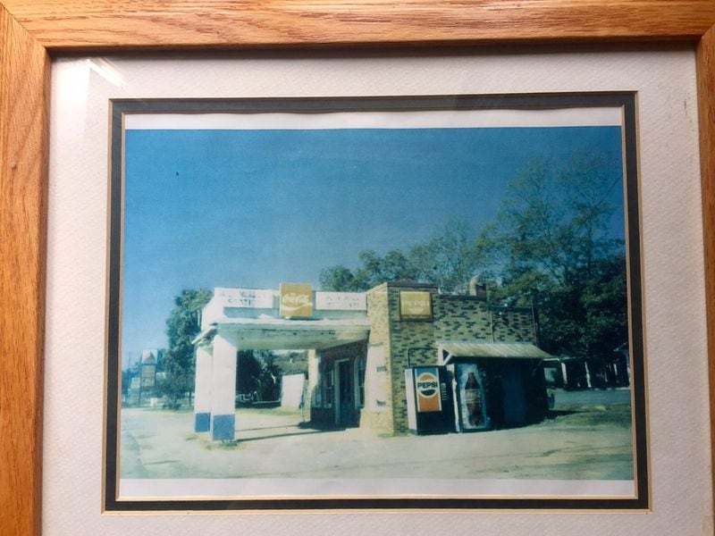 Hanging on the wall at Billy Meadow’s Station is a picture of the original location, demolished when the highway through Colbert was widened.