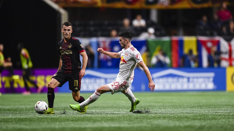 Atlanta United defender Brooks Lennon #11 dribbles the ball during the match against New York Red Bulls at Mercedes-Benz Stadium in Atlanta, United States on Wednesday August 17, 2022. (Photo by Mitchell Martin/Atlanta United)