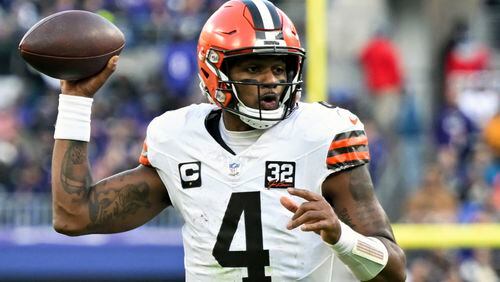 FILE - Cleveland Browns quarterback Deshaun Watson (4) scrambles as he looks to throw a pass during the second half of an NFL football game against the Baltimore Ravens, Sunday, Nov. 12, 2023, in Baltimore. Browns quarterback Deshaun Watson said he's following a conservative plan as he recovers from major shoulder surgery, but that he's been able to throw at full speed. “Everything is fluid motion, no hinging,” Watson said Tuesday, April 16, 2024, raising his arm to demonstrate. (AP Photo/Terrance Williams, File)