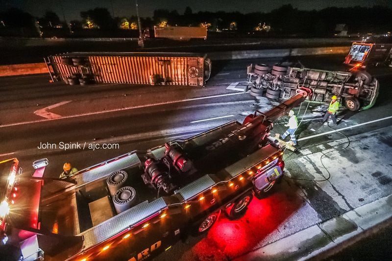 The big rig was wrecked across multiple westbound lanes of I-285 north of I-85 early Tuesday morning.