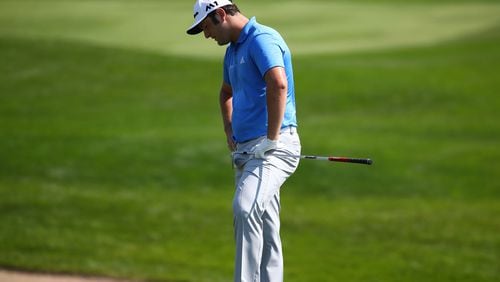 Jon Rahm ponders life after a less than pleasing chip shot Friday at the  BMW Championship. (Gregory Shamus/Getty Images)