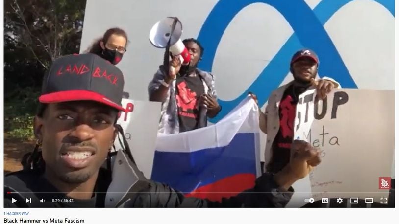 Black Hammer Party leader Gazi Kodzo, left, protested in March at Facebook headquarters in San Francisco over censorship of pro-Russian posts. Kodzo livestreamed the protest over YouTube. The U.S. Department of Justice on Friday said the trip was funded as part of a secret Russian influence campaign by an unregistered foreign agent.