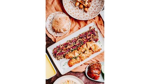 The menu for Raik Mediterranean Kitchen includes flatbreads, sides and main dishes including filet mignon kabob and a falafel plate. / Courtesy of Raik Mediterranean Kitchen