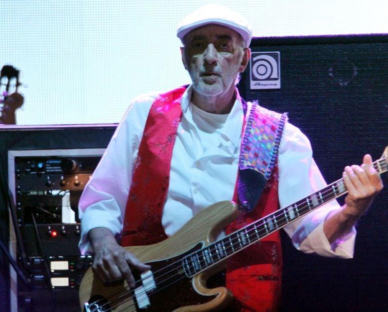 #3 of #22. PLEASE KEEP IN SEQUENTIAL ORDER FOR THE CONTINUITY OF THE GALLERY. -- Bassist John McVie lays down the bottom on "You Make Loving Fun." Iconic rockers Fleetwood Mac brought their On With the Show tour to an energized and sold out Philips Arena Wednesday night, December 17, 2014. Touring with Christine McVie for the first time in 16 years, Stevie Nicks, Mick Fleetwood, Lindsey Buckingham and John McVie looked and sounded in exceptional form. Robb D. Cohen/RobbsPhotos.com John McVie, looking a bit thinner after his bout with cancer, anchored the show with his steady thumps. Photo: Robb D. Cohen/www.RobbsPhotos.com.