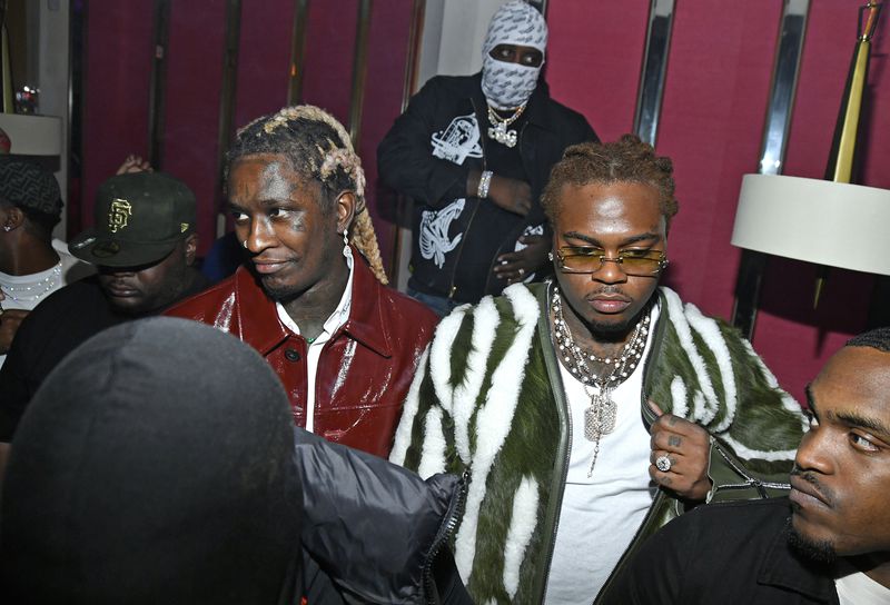 In this photo from of Oct. 12, 2021, hip-hop artists Young Thug, left center, and Gunna, right center, attend a release party for Young Thug's new album "PUNK" at Delilah in West Hollywood, California. (Michael Tullberg/Getty Images/TNS)