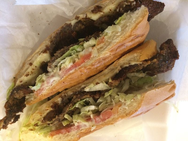 At Cuba Mia, the Steak Milanesa sandwich consists of thin slices of crispy fried beefsteak on a 9-inch loaf with lettuce, tomato, white cheese and mayo, all pressed flat like a Cuban sandwich. CONTRIBUTED BY WENDELL BROCK