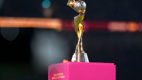 FILE - The tournament trophy is displayed on the pitch before the Women's World Cup soccer final between Spain and England at Stadium Australia in Sydney, Australia, on Aug. 20, 2023. Brazil's bid for the 2027 Women's World Cup was ranked higher than the bid submitted by Germany, the Netherlands and Belgium in an evaluation report released by FIFA on Tuesday, May 7, 2024. (AP Photo/Abbie Parr, File)
