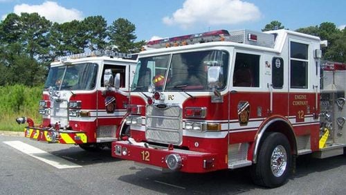 Guns were stolen from personal vehicles of Forsyth County firefighters.