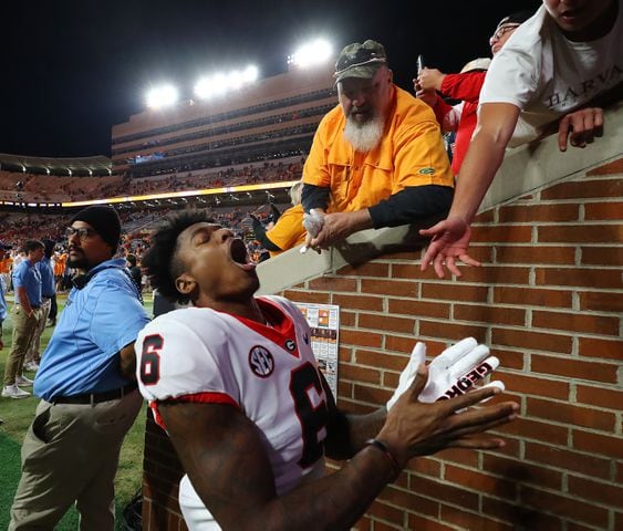 Georgia wide receiver Dominic Lovett celebrates a 38-10 victory over Tennessee in a NCAA college football game on Saturday, Nov. 18, 2023, in Knoxville.  Curtis Compton for the Atlanta Journal Constitution