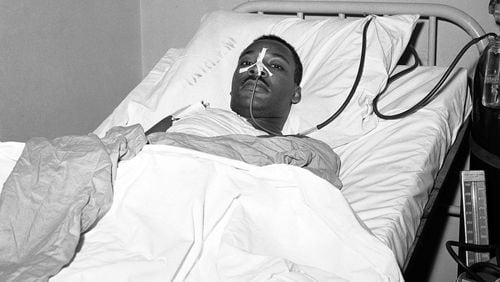 In this Sept. 21, 1958, file photo, Martin Luther King Jr. recovers from surgery at New York's Harlem Hospital after an operation to remove a steel letter opener from his chest.