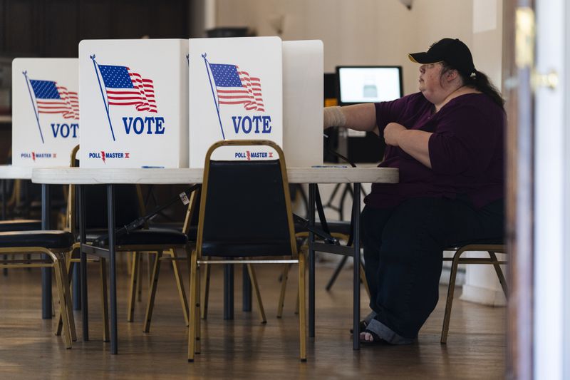 A voter marks their ballot at a polling place in Bristol, Pa., Tuesday, April 23, 2024. (AP Photo/Matt Rourke)