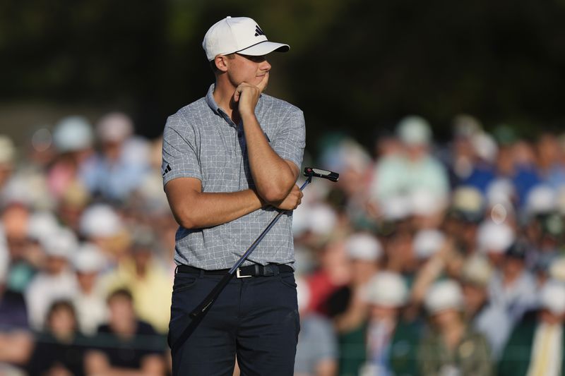 Ludvig Aberg, of Sweden, waits to putt on the 18th hole during final round at the Masters golf tournament at Augusta National Golf Club Sunday, April 14, 2024, in Augusta, Ga. (AP Photo/Charlie Riedel)