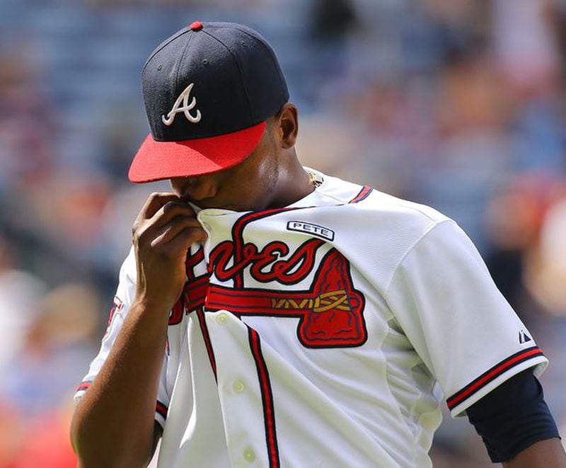 Braves starter Julio Teheran reacts after giving up a three-run triple to Ben Revere on Monday. (Curtis Compton photo/AJC)