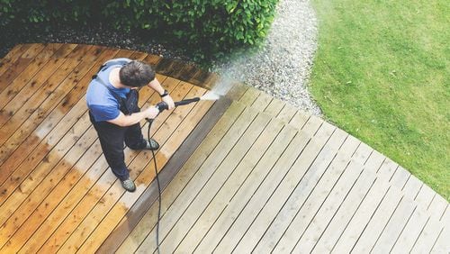 A professional will know the right type of cleaner and pressure washer to use for your project, ensuring the best results the first time around. (Dreamstime)