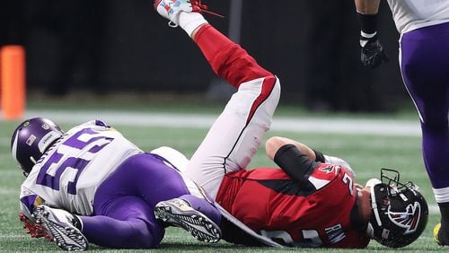 Falcons quarterback Matt Ryan is tackled by Vikings linebacker Anthony Barr on a quarterback keeper during the second half in a NFL football game on Sunday, December 3, 2017, in Atlanta.  Curtis Compton/ccompton@ajc.com