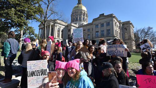 Marchers gather outside the Capitol during the Women's March Atlanta and Power to the Polls rally on Saturday, January 20, 2018, marking the first anniversary of the historic Women's Marches held in Atlana and across the nation. The women's movement ignited by Donald Trump's election triggered a wave of political involvement from newly energized activists.