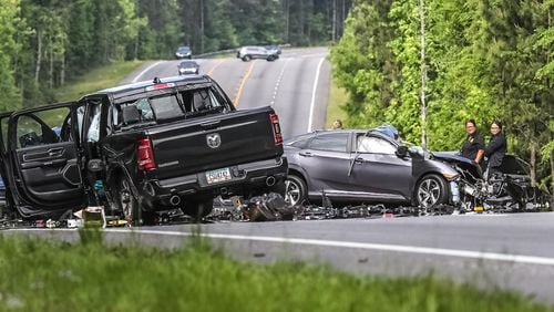Two vehicles, a black pickup truck and a gray sedan, were involved in a fatal collision Monday morning on Jonesboro Road, one of three wrecks that happened within a half-mile.