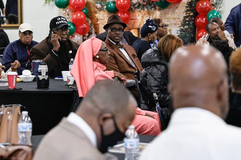Members of the community look on while listening to speakers during a forum on youth gun violence in Atlanta at Vicars Community Center on Monday, December 5, 2022. (Natrice Miller/natrice.miller@ajc.com)  