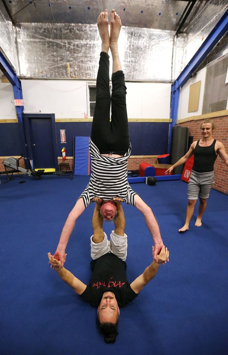 Acrobat Steve Seaberg, 85, defies gravity (and aging) as he practices with Tim Mack for upcoming events with the Imperial OPA Circus at Buck’s Sport Barn on May 17, 2016, in Atlanta. CURTIS COMPTON / CCOMPTON@AJC.COM