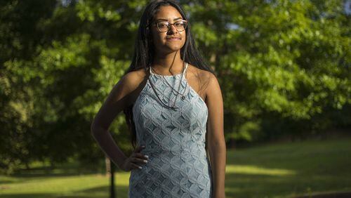 Marisela Lozada, shown at Benteen Park in Atlanta, will attend Harvard on full scholarship in August. She is the first in her family to attend a four-year university.