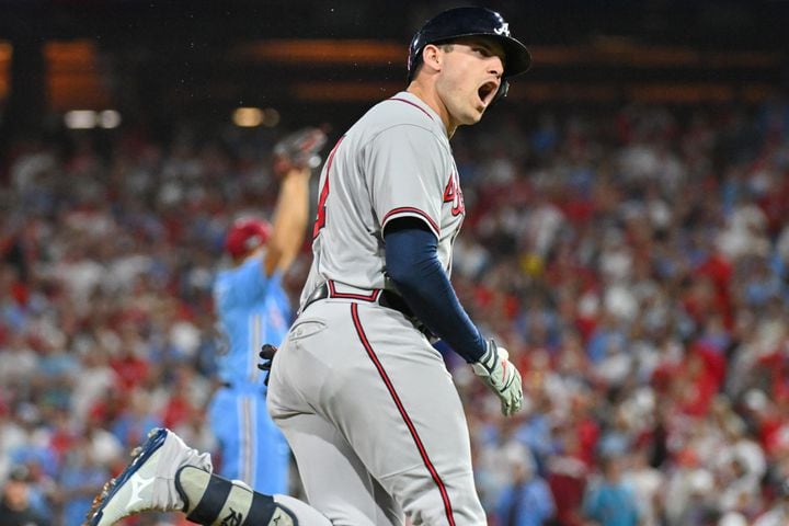 Atlanta Braves’ Austin Riley celebrates after a solo home run against the Philadelphia Phillies during the fourth inning of NLDS Game 4 at Citizens Bank Park in Philadelphia on Thursday, Oct. 12, 2023.   (Hyosub Shin / Hyosub.Shin@ajc.com)