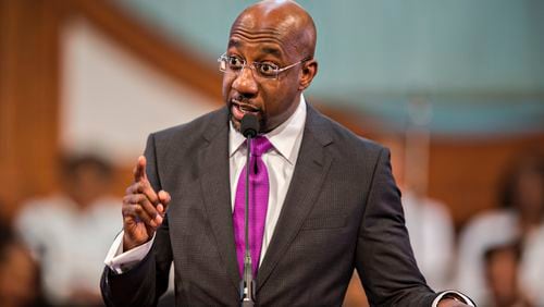 Rev. Raphael G. Warnock speaks during the 48th Martin Luther King Jr. Annual Commemorative Service at Ebenezer Baptist Church in Atlanta . JONATHAN PHILLIPS / SPECIAL